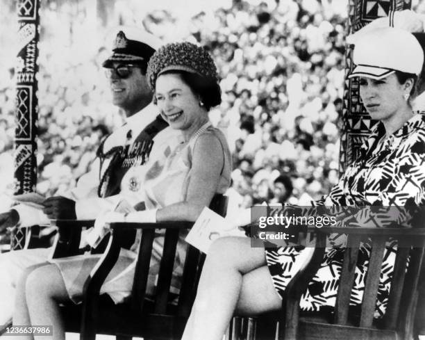 Prince Philip, Duke of Edinburgh , Queen Elizabeth II and Princess Anne attend the Trooping the Colour ceremony, on march 7, 1970 in Suva during...