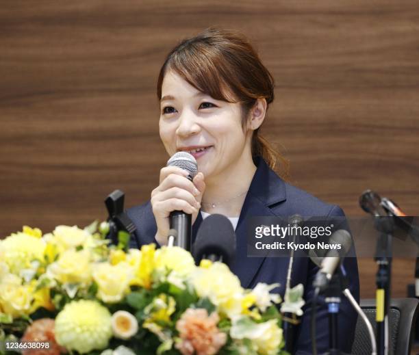 Two-time women's weightlifting Olympic medalist Hiromi Miyake, who represented Japan at five games, attends a retirement press conference in Tokyo on...