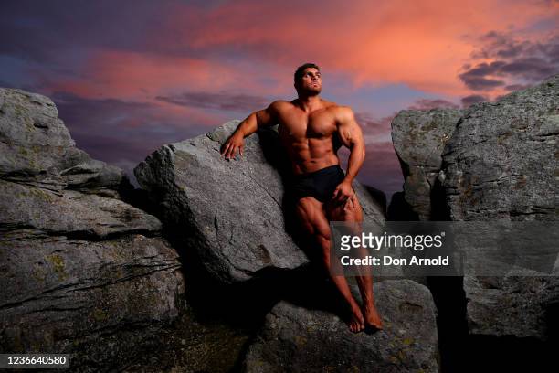 Chris Kavvalos poses during an early morning photo shoot at Little Bay on May 31, 2020 in Sydney, Australia. IFBB body builder Chris Kavvalos has...
