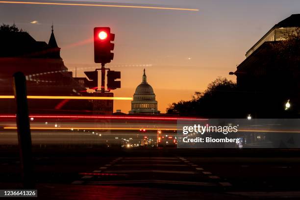 Light trails from vehicles near the U.S. Capitol in Washington, D.C., U.S., on Thursday, Nov. 18, 2021. The House Budget chair this week said that he...