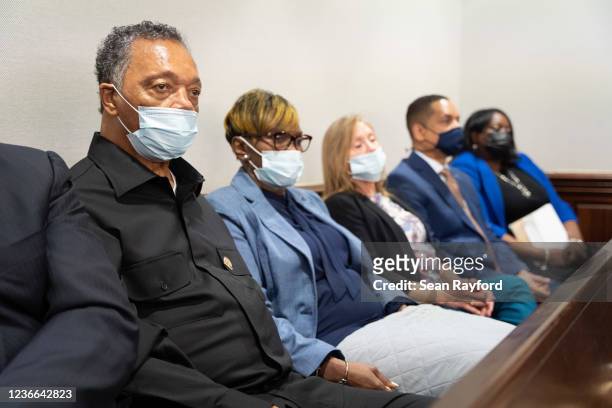 Rev. Jesse Jackson sits with Wanda Cooper-Jones, mother of Ahmaud Arbery, during the trial of the killers of Arbery at the Glynn County Courthouse on...