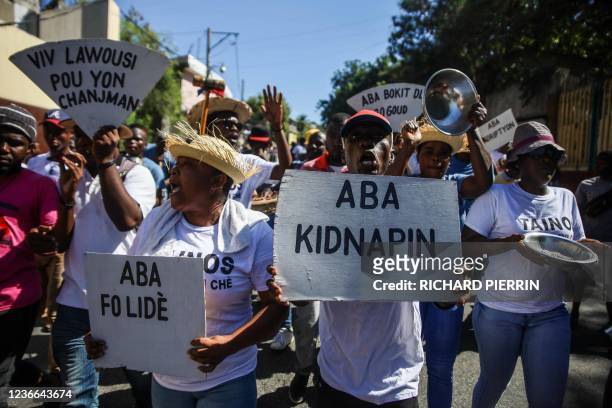 People protest against the countrys spike in kidnappings and gang-aggravated fuel crisis, on the day marking the 218th anniversary of the Battle of...