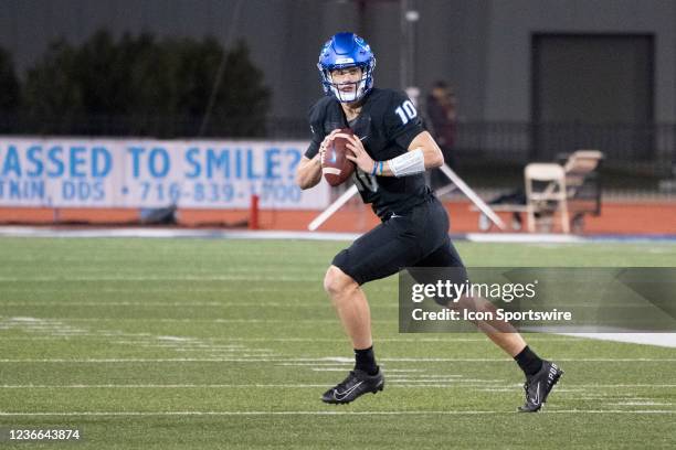 Buffalo Bulls Quarterback Matt Myers rolls out looking to throw the ball during the first half of the College Football game between the Northern...