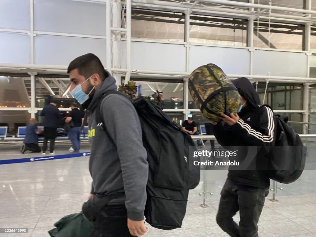 A group of Iraqi migrants stranded on the Belarus-Polish border arrive in Erbil