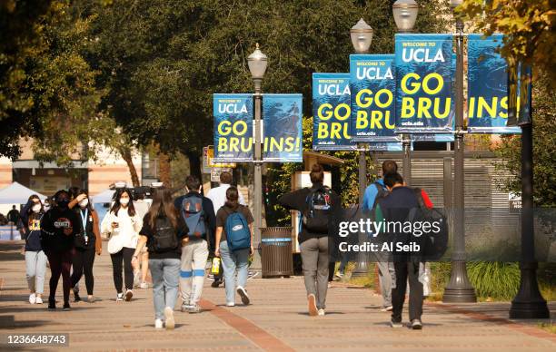 Photos of students on the UCLA campus as UCLA lecturers and students celebrate after a strike was averted Wednesday morning. Lecturers across the UC...