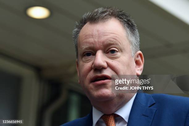 Britains chief Brexit negotiator David Frost looks on as he leaves the European Union headquarters in Brussels on November 19 after a meeting on...