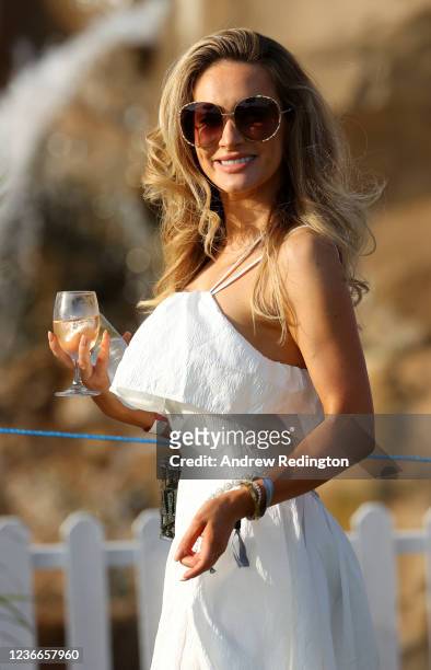 Lady spectator look on at the 18th green on Ladies Day during Day Two of The DP World Tour Championship at Jumeirah Golf Estates on November 19, 2021...