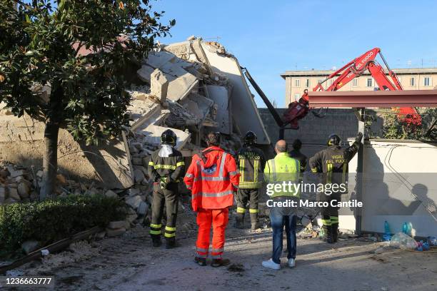 Firefighters in front of the rubble of the completely collapsed building in San Felice Cancello, in the province of Caserta, following an explosion...