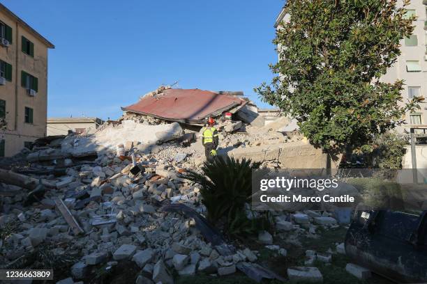 Firefighter walked on the rubble of the completely collapsed building in San Felice Cancello, in the province of Caserta, following an explosion due...