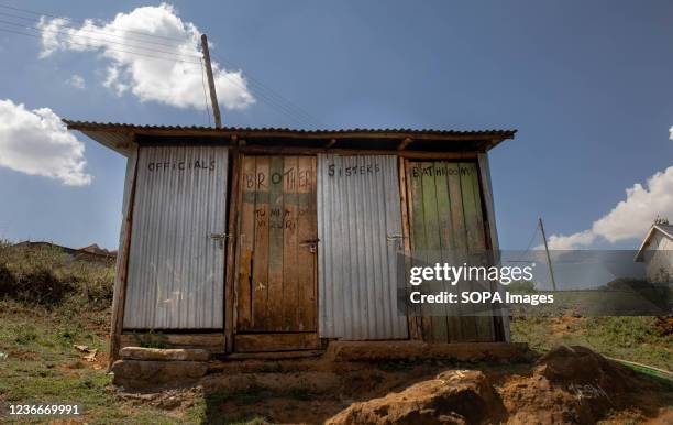Doors of the local community public toilets are pictured closed in Kibera. World Toilet Day is an official United Nations international observance...