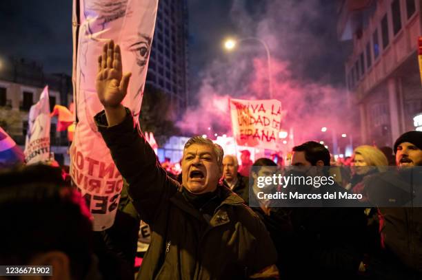 Far right wing members and supporters of La Falange are seen raising their hands making a fascist salute during a demonstration marking the 85th...