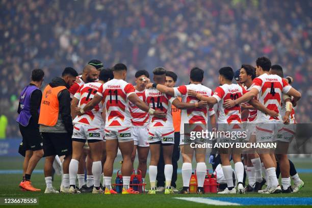 Japan players form a team huddle on the pitch ahead of the Autumn International friendly rugby union match between Scotland and Japan at Murrayfield...