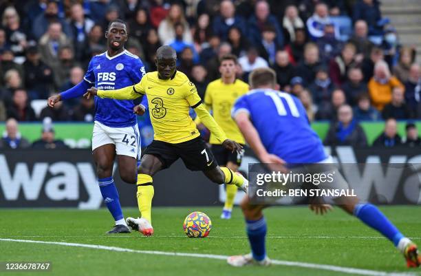 Chelsea's French midfielder N'Golo Kante scores his team's second goal during the English Premier League football match between Leicester City and...