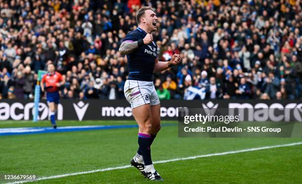 Scotland's Stuart Hogg celebrates scoring the second try of the match to become Scotland's highest try scorer during the Autumn Nations Series match...