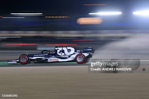 AlphaTauri's Japanese driver Yuki Tsunoda drives during the qualifying session ahead of the Qatari Formula One Grand Prix at the Losail International...