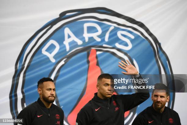 Paris Saint-Germain's Brazilian forward Neymar, Paris Saint-Germain's French forward Kylian Mbappe and Paris Saint-Germain's Argentinian forward...