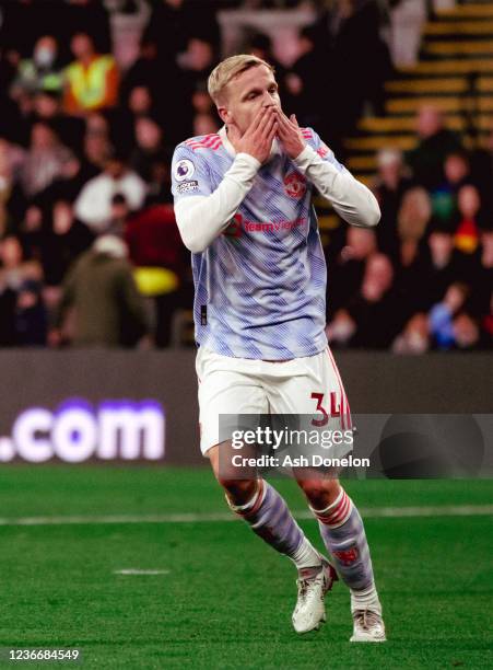 Donny van de Beek of Manchester United celebrates scoring a goal to make the score 2-1 during the Premier League match between Watford and Manchester...