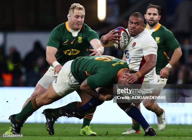 South Africa's Malcolm Marx tackles England's prop Kyle Sinckler during the Autumn International friendly rugby union match between England and South...