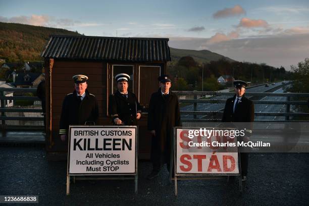 Border Communities against Brexit protestors dressed as customs officials man an unofficial border checkpoint on the Irish border as they take part...