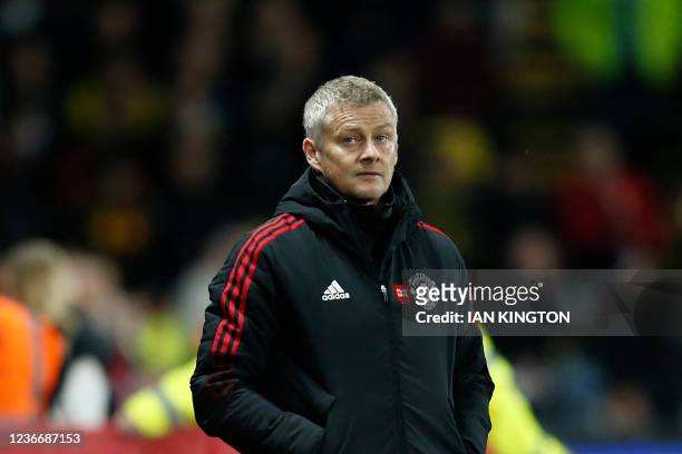 Manchester United's Norwegian manager Ole Gunnar Solskjaer reacts during the English Premier League football match between Watford and Manchester...