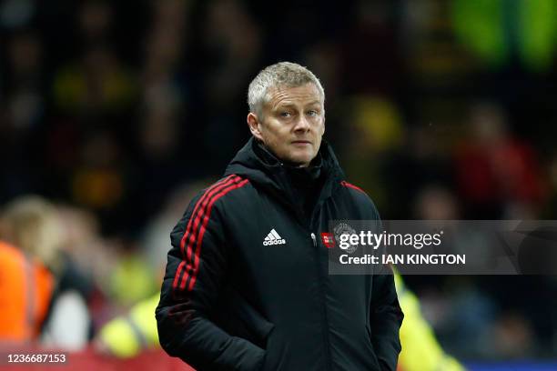 Manchester United's Norwegian manager Ole Gunnar Solskjaer reacts during the English Premier League football match between Watford and Manchester...