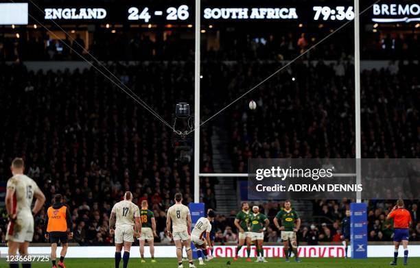 England's fly-half Marcus Smith converts the final penalty to take the score to 27-26 during the Autumn International friendly rugby union match...