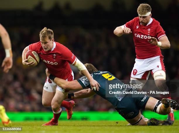 Wales' Nick Tompkins tackled by Australia's Izack Rodda during the Autumn International match at the Principality Stadium, Cardiff. Picture date:...