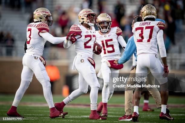 Akeem Dent of the Florida State Seminoles reacts after catching an interception during the fourth quarter against the Boston College Eagles at Alumni...