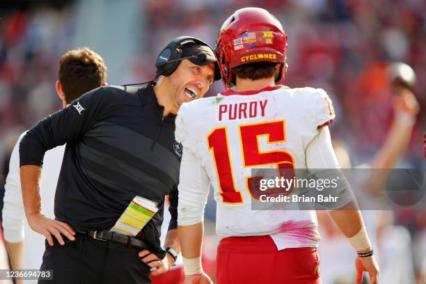 Head coach Matt Campbell talks with quarterback Brock Purdy of the Iowa State Cyclones during a timeout in the fourth quarter at Gaylord Family...