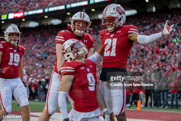 Wisconsin Badgers corner back Caesar Williams celebrates after a 4th down pass breakup of Wisconsin Badgers safety Scott Nelson durning a college...