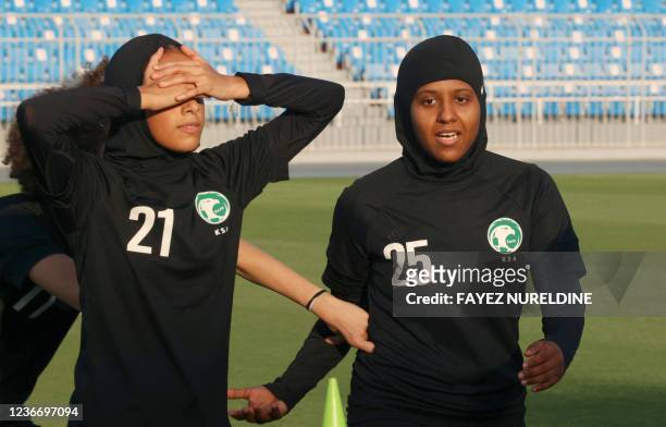 Players of the first Saudi Women's National Football Team, managed by veteran German Monika Staab, attend a training and show off their skills at...