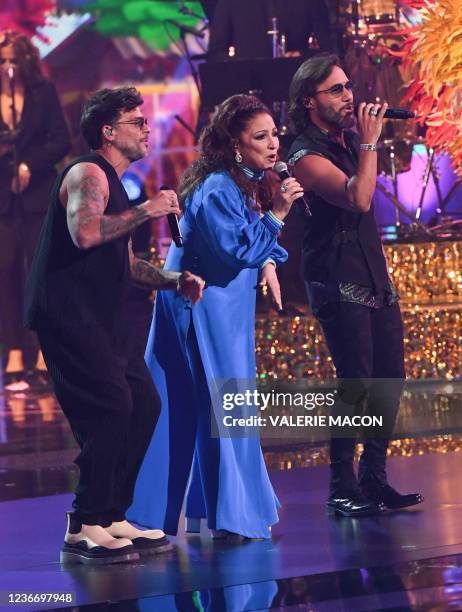 Cuban singer-songwriter Gloria Estefan, Argentine singer Diego Torres and Puerto Rican singer Pedro Capo perform on stage during the 22nd Annual...