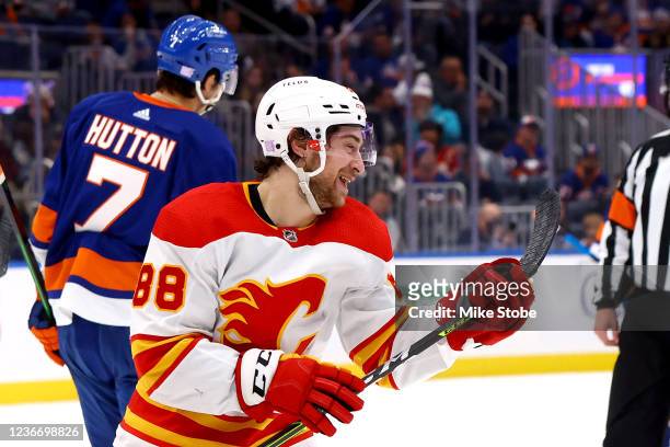 Andrew Mangiapane of the Calgary Flames celebrates after scoring a goal against the New York Islanders during the second period at UBS Arena on...