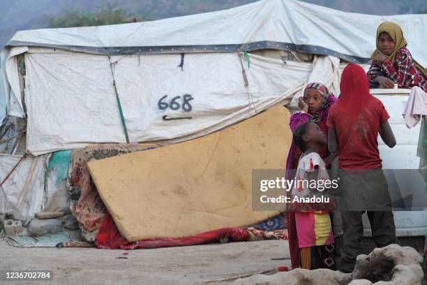 Yemeni refugees are seen as they are living under miserable conditions at makeshift tents during cold weather in Taiz, Yemen on November 20, 2021....