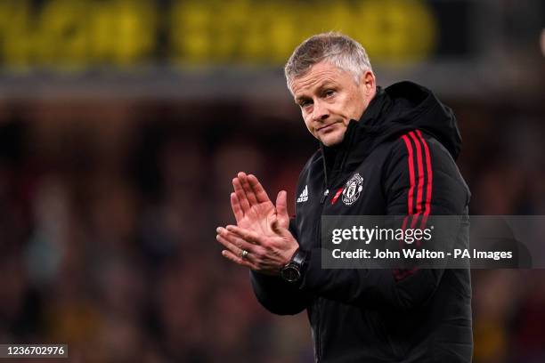 Manchester United manager Ole Gunnar Solskjaer applauds the fans at the end of the match during the Premier League match at Vicarage Road, Watford....