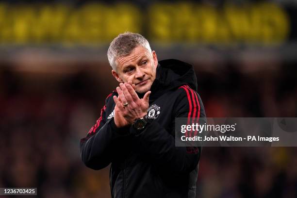 Manchester United manager Ole Gunnar Solskjaer applauds the fans at the end of the match during the Premier League match at Vicarage Road, Watford....