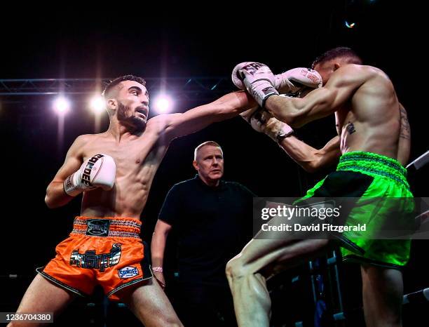Dublin , Ireland - 20 November 2021; Faisal Azimi, left, and Steve Archambault during their Muay Thai 64.5kg bout at Capital 1 Dublin in the National...