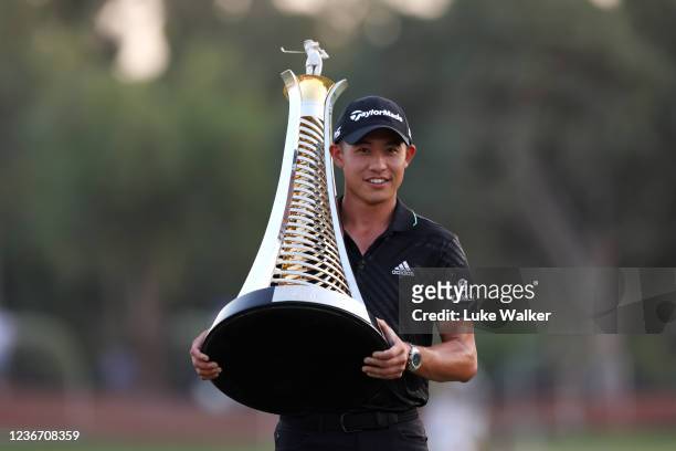 Collin Morikawa of United States with The Race to Dubai trophy as he wins The DP World Tour Championship and The Race to Dubai during Day Four of The...