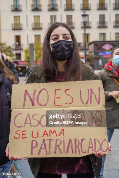 Protester holds a placard saying no es un caso aislado se llama patriarcado", during the demonstration. Women's groups held a demonstration to...