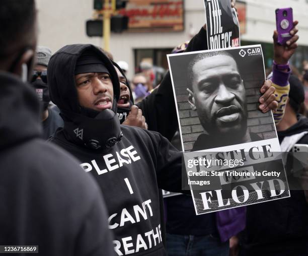 Minneapolis, MN May 29: Peaceful protesters, including Actor and comedian Nick Cannon celebrated the memory of George Floyd and demanded justice...