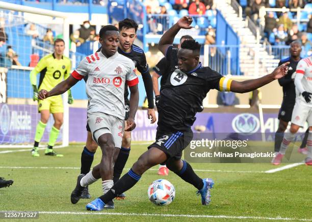 Victor Wanyama of CF Montréal defends the ball against Richie Laryea of Toronto FC in the second half during the 2021 Canadian Championship Final at...