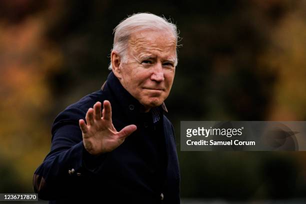 President Joe Biden walks to the West Wing from Marine One on the South Lawn off the White House on November 21, 2021 in Washington, DC. The...