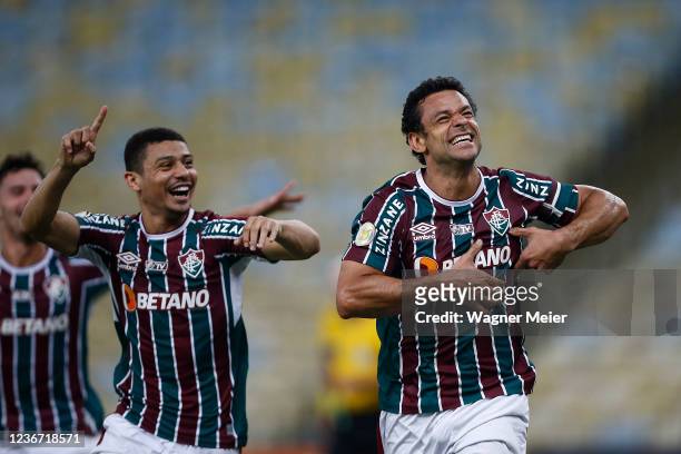 Fred of Fluminense celebrates with teammate Andre after scoring the second goal of his team during a match between Fluminense and America MG as part...
