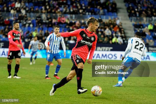 Sergio Gonzalez seen in action during the La Liga Smartbank match between Malaga CF and CD Tenerife at La Rosaleda Stadium, in Malaga. .