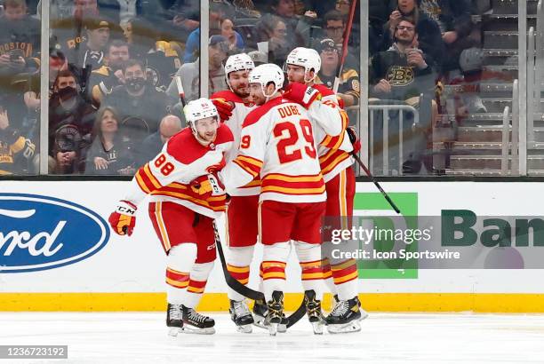 Calgary celebrates the shorty from Calgary Flames right wing Andrew Mangiapane during a game between the Boston Bruins and the Calgary Flames on...