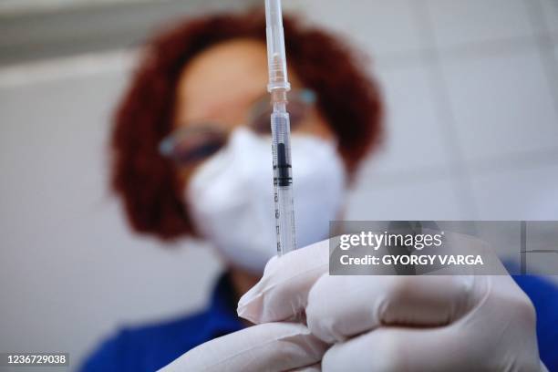 Nurse prepares a vaccine of Pfizer-BioNTech against Covid-19 in the vaccination center of the 'Kanizsai Dorottya' hospital in Nagykanizsa, Hungary,...