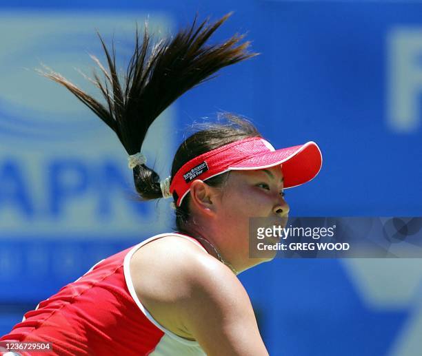 Shuai Peng of China, plays a smash during her upset win over Anastasia Myskina of Russia, during the Sydney International tennis tournament, 11...