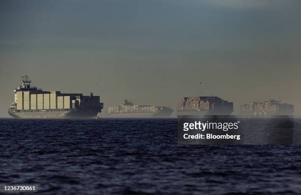Container ships at anchor outside the Port of Los Angeles in Los Angeles, California, U.S., on Sunday, Nov. 21, 2021. Shipments to the Port of Los...