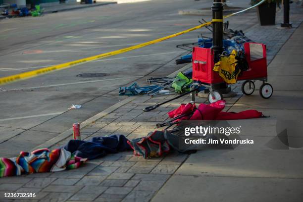 Debris left following a driver plowing into the Christmas parade on Main Street in downtown November 22, 2021 in Waukesha, Wisconsin. Five people...