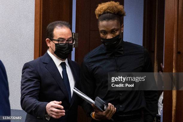 Former Las Vegas Raiders player Henry Ruggs III appears in court with his attorney Richard Schonfeld at the Regional Justice Center on November 22,...